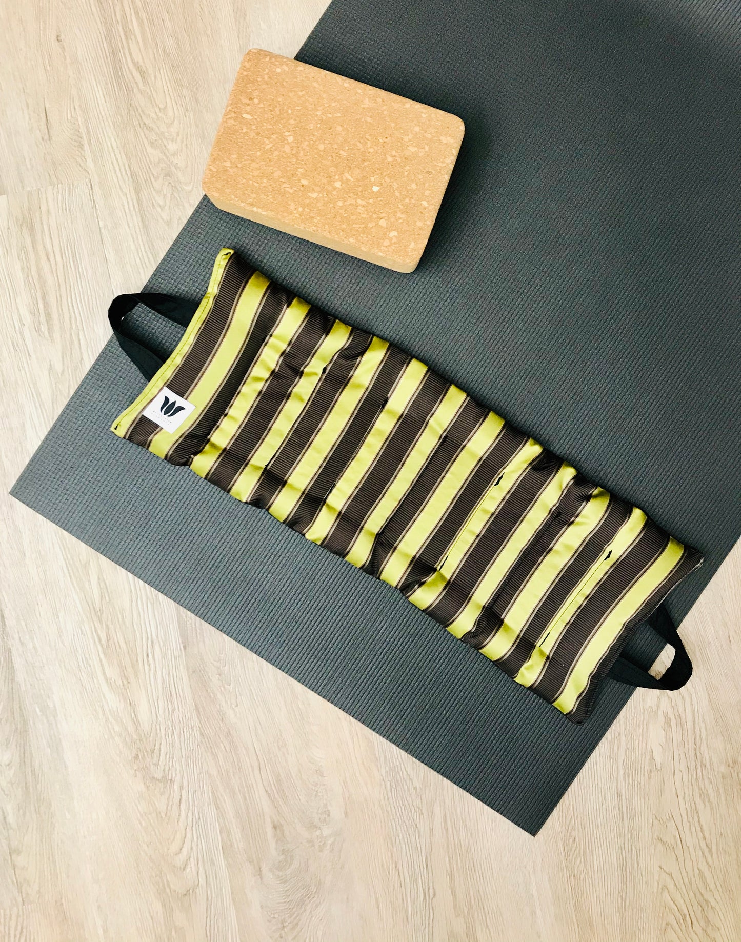 Yoga Sandbag version by My Yoga Room Elements. Add grounding to your practice with this heatable yoga prop. Handcrafted in Calgary in sateen striped fabric.