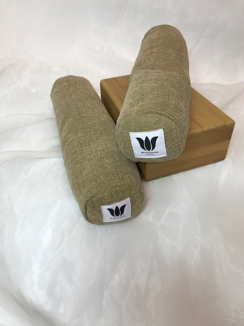 Mini yoga bolster in durable fabric, solid light brown plush fabric. Cushion and support the body in the practice of yoga and meditation.Removeable cover. Made in Canada by My Yoga Room Elements