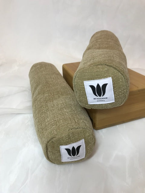 Mini yoga bolster in durable fabric, solid light brown plush fabric. Cushion and support the body in the practice of yoga and meditation.Removeable cover. Made in Canada by My Yoga Room Elements
