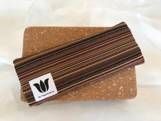 Yoga eye pillow, unscented, therapeutically weighted to soothe eye strain and stress or enhance your savasana. Handcrafted in Canada by My Yoga Room Elements. Pumpkin spice textured stripe print and bamboo fabric.