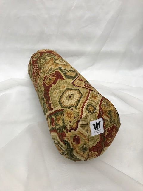Round yoga bolster in cotton canvas in earth tone ikat print fabric. Allergy conscious fill with removeable cover. Made in Canada by My Yoga Room Elements