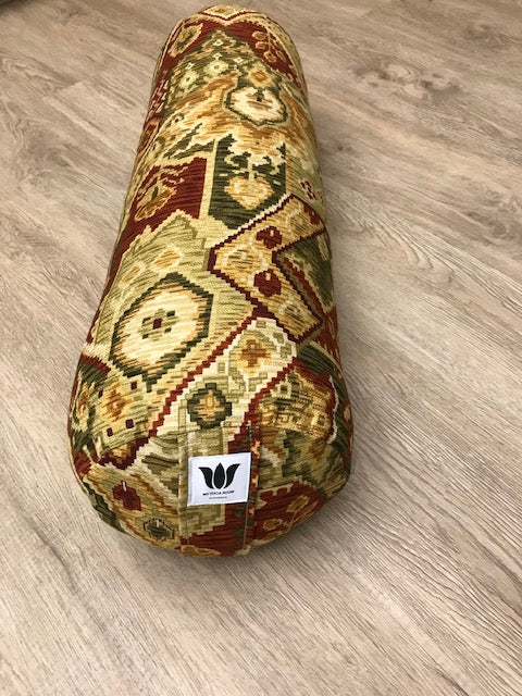 Round yoga bolster in cotton canvas in earth tone ikat print fabric. Allergy conscious fill with removeable cover. Made in Canada by My Yoga Room Elements