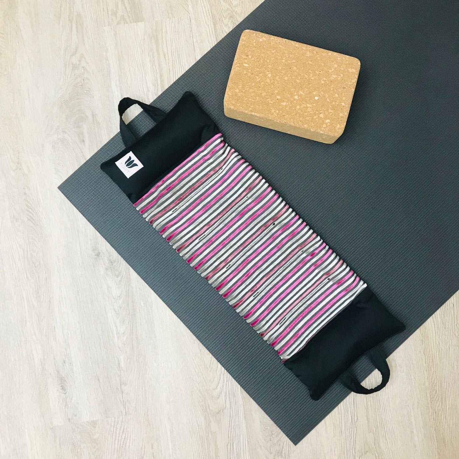 Yoga Sandbag version by My Yoga Room Elements. Add grounding to your practice with this heatable yoga prop. Handcrafted in Calgary in plush striped fabric.