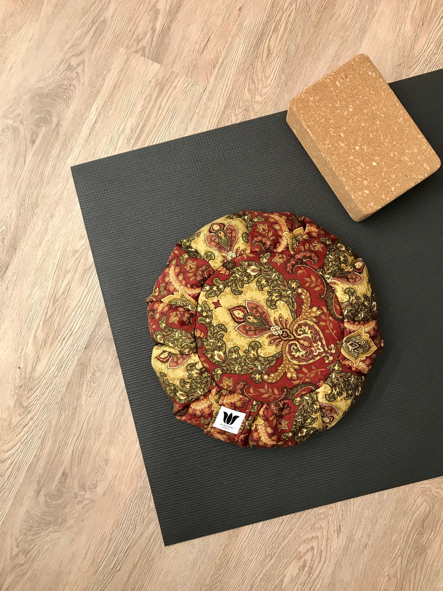 Handcrafted premium cotton canvas fabric meditation seat cushion in cranberry red, rich gold and green damask print fabric. Align the spine and body in comfort to calm the monkey mind in your meditation practice. Handcrafted in Calgary, Alberta Canada