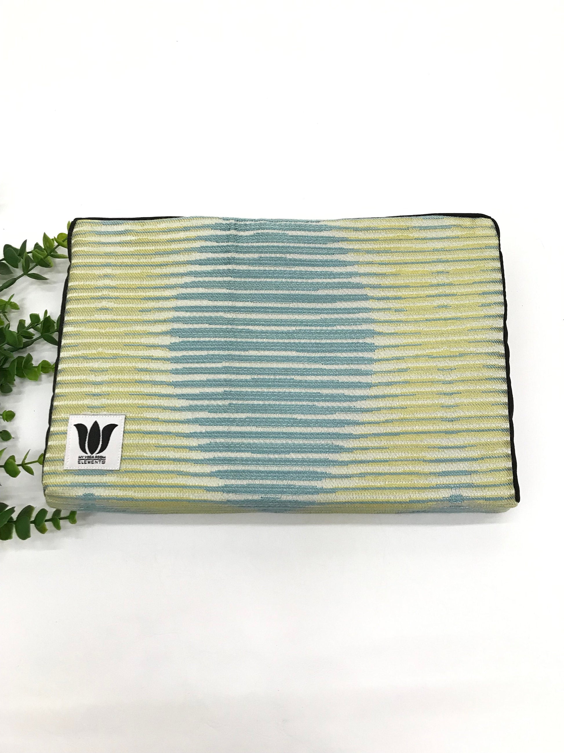 2 x 8 x 12 inch fabric covered yoga block. High density foam insert covered with green and yellow stripe patterned cotton fabric. Handcrafted in Canada by My Yoga Room Elements