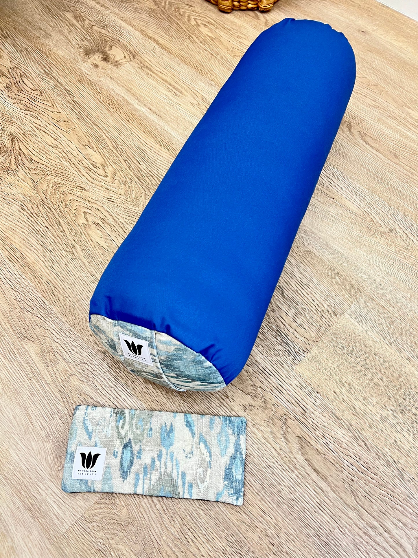 http://www.myyogaroomelements.com Yoga Bolster and Eye Pillow Set in Postal Blue with matching Ikat print. Handcrafted in Canada by My Yoga Room Elements